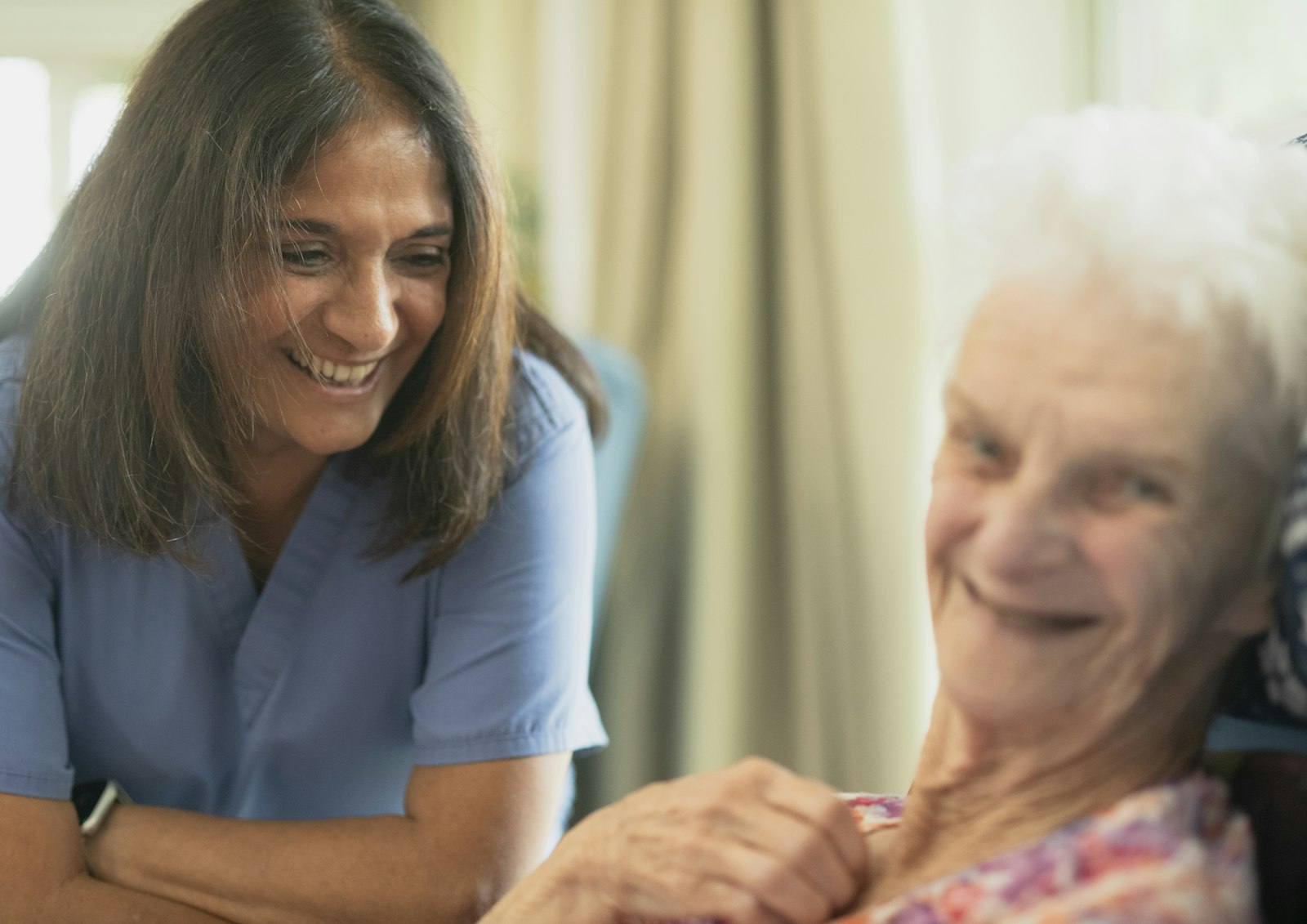 Caregiver attending to a patient